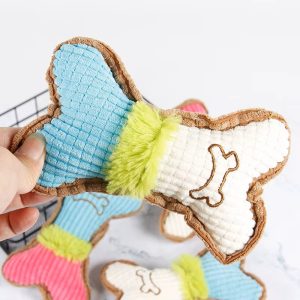 Csont formájú plüss sipoló kutyajáték 17cm Csont formájú plüss sipoló kutyajáték 17cm